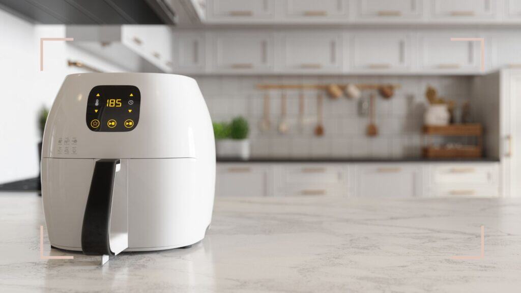 Modern white air fryer on a kitchen counter for 2025 buying guide